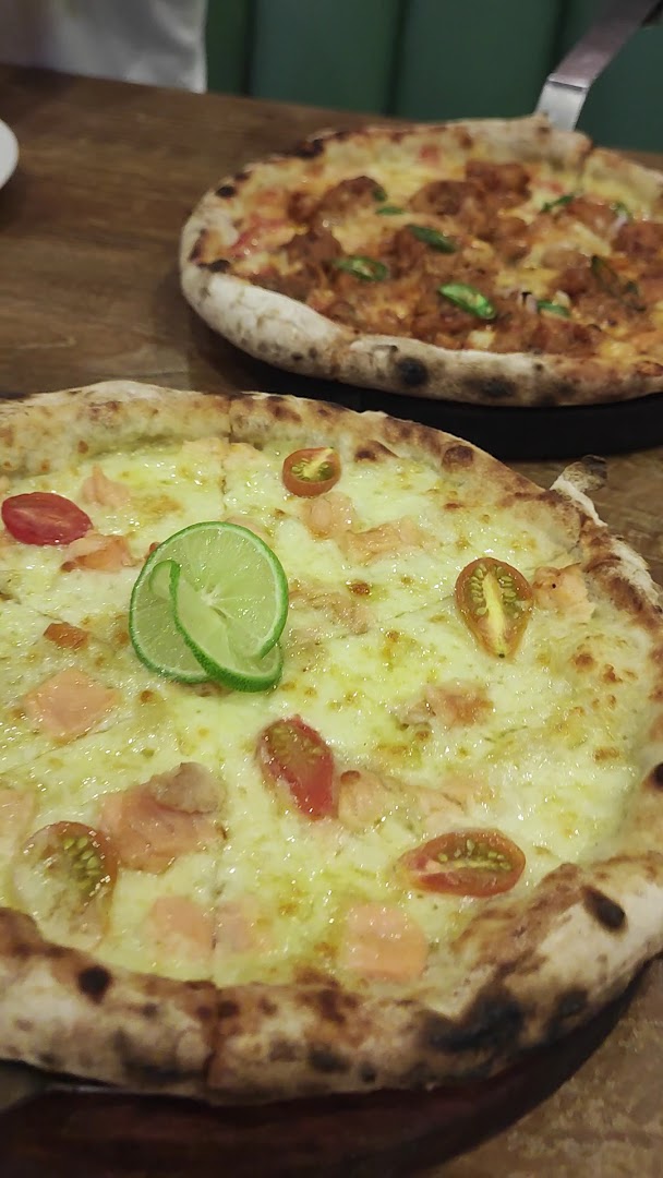 Vito Wood Fired Pizza: appetizing photo of wood-fired pizzas