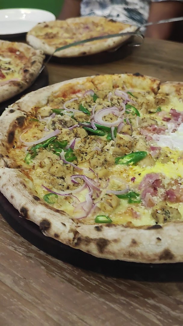 Vito Wood Fired Pizza: appetizing photo of wood-fired pizza