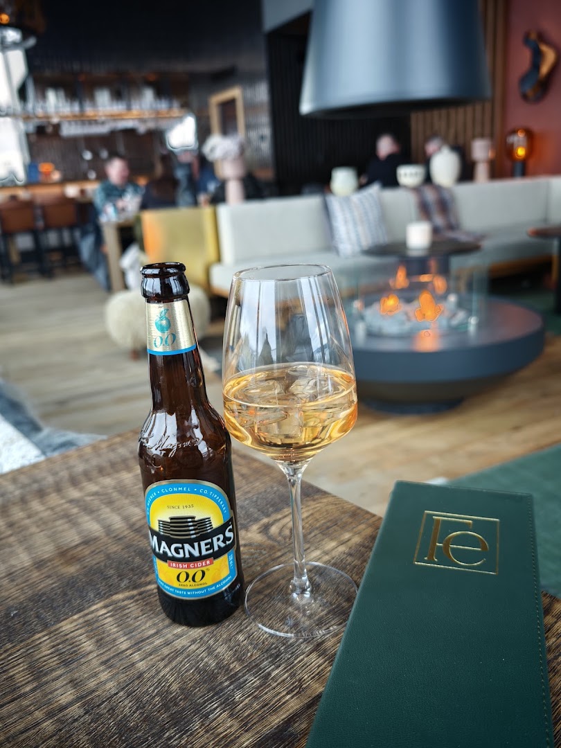 Rooftop by Fe: inviting atmosphere with drink focus
