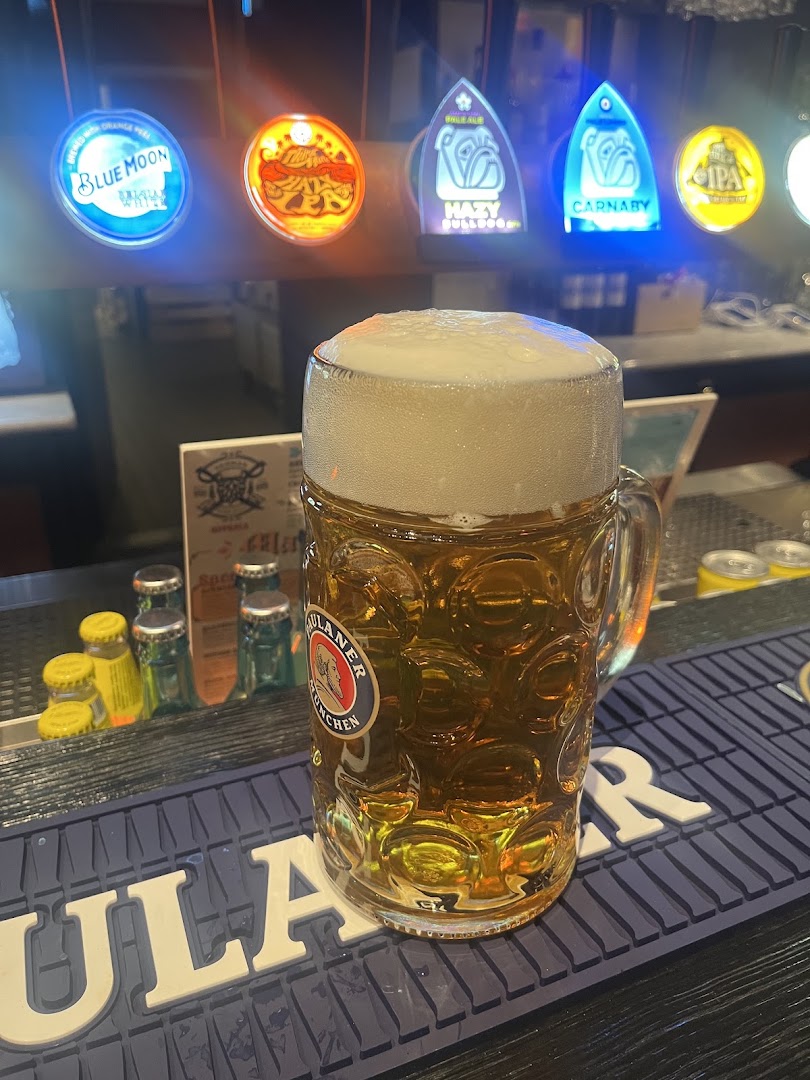 German Beer Hall: appetizing beer photo at bar
