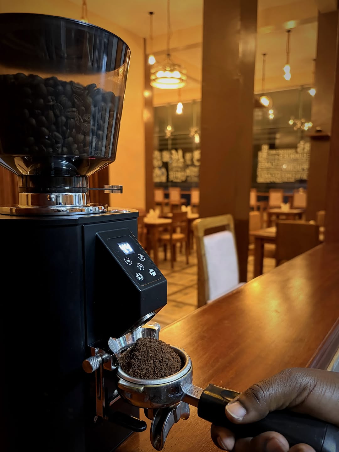 M&S Café: professional shot of coffee preparation