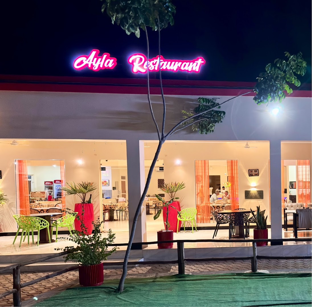 Ayla Restaurant & Cafe: clear, inviting exterior night shot
