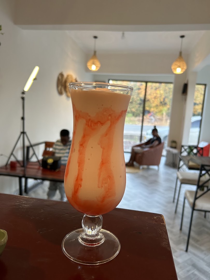 Meko's Coffee: appetizing drink in cafe setting