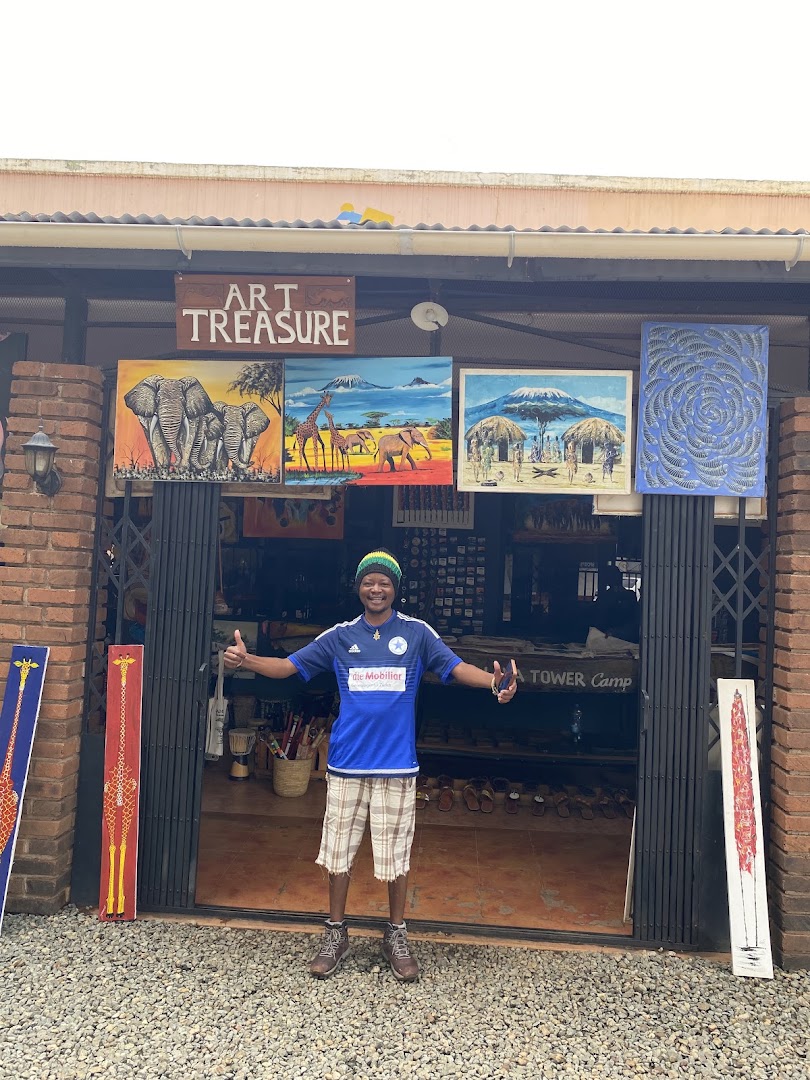 Art Treasure: clear storefront with shop owner