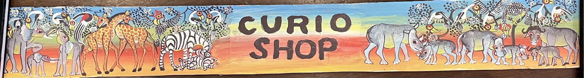 Chui Traders Ltd: artistic storefront signage