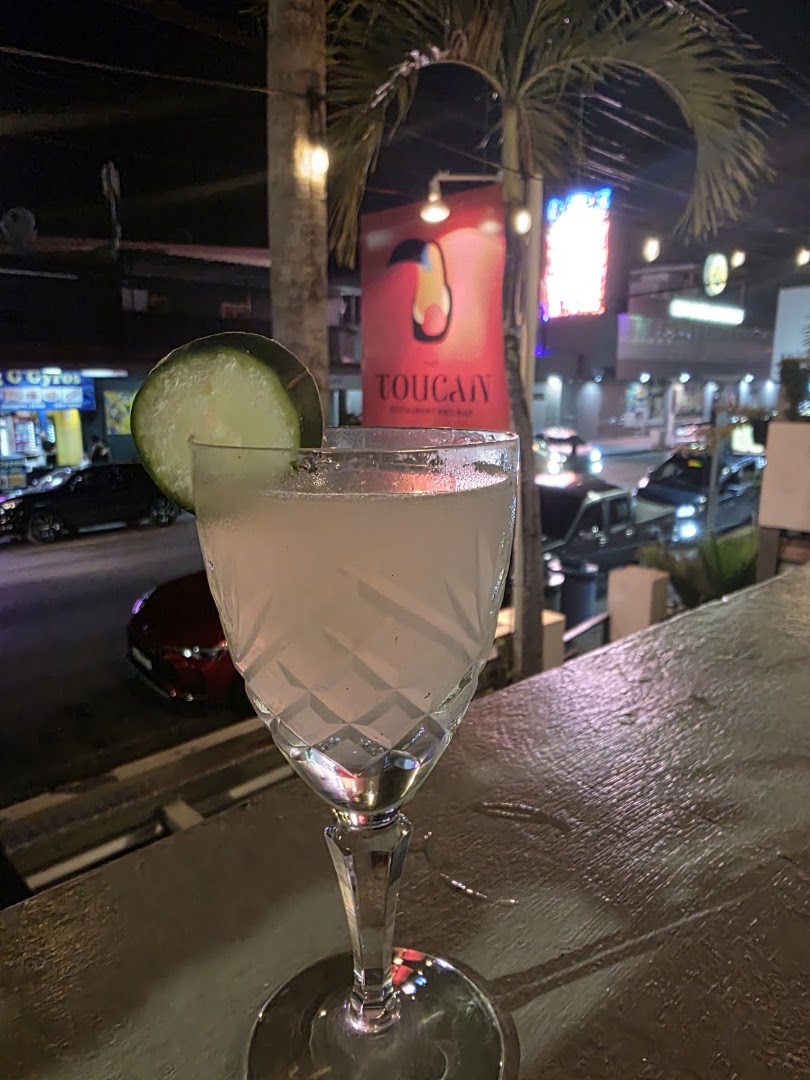 The Toucan Restaurant & Bar: appetizing drink with venue branding