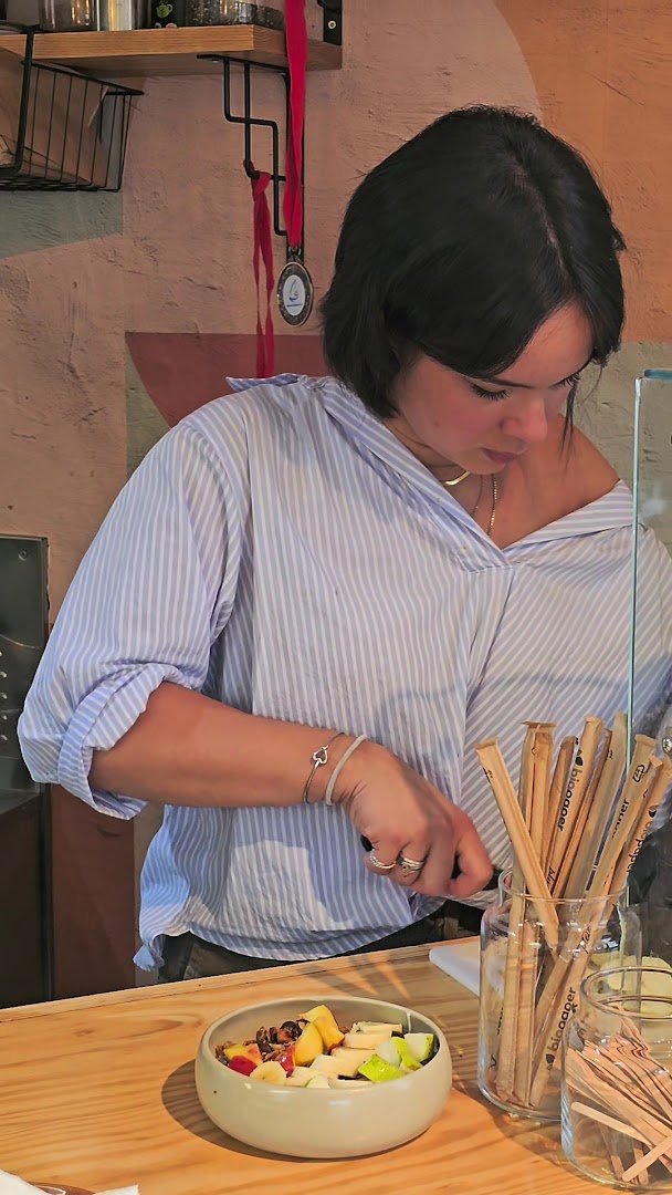 Madelina: professional photo of staff preparing food