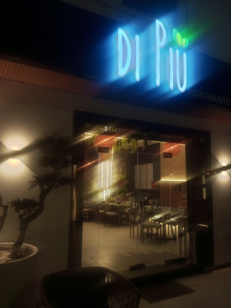 Di Più Ristorante: inviting exterior view at night