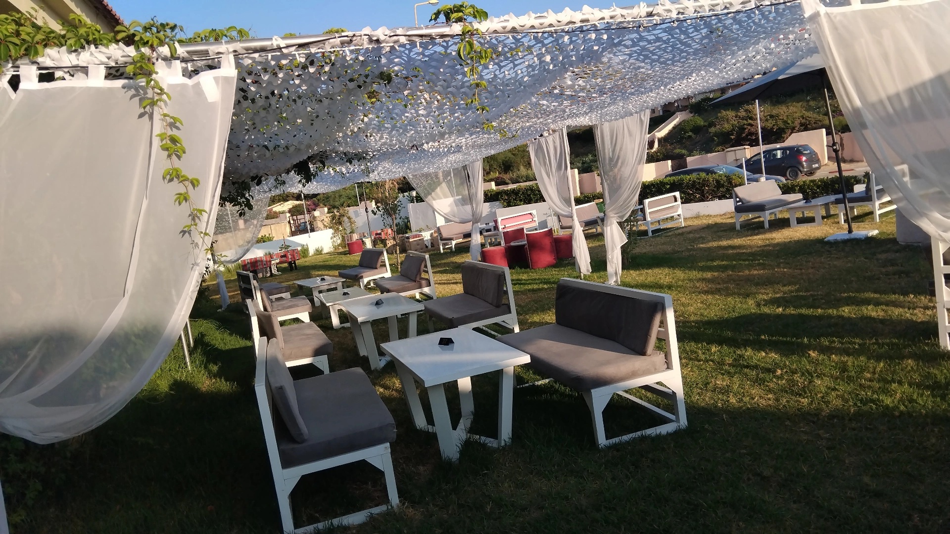 Pin's Beach: inviting outdoor seating area shown