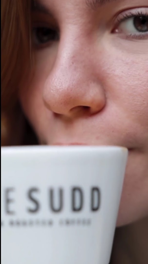 The Sudd Coffee: customer enjoying the coffee