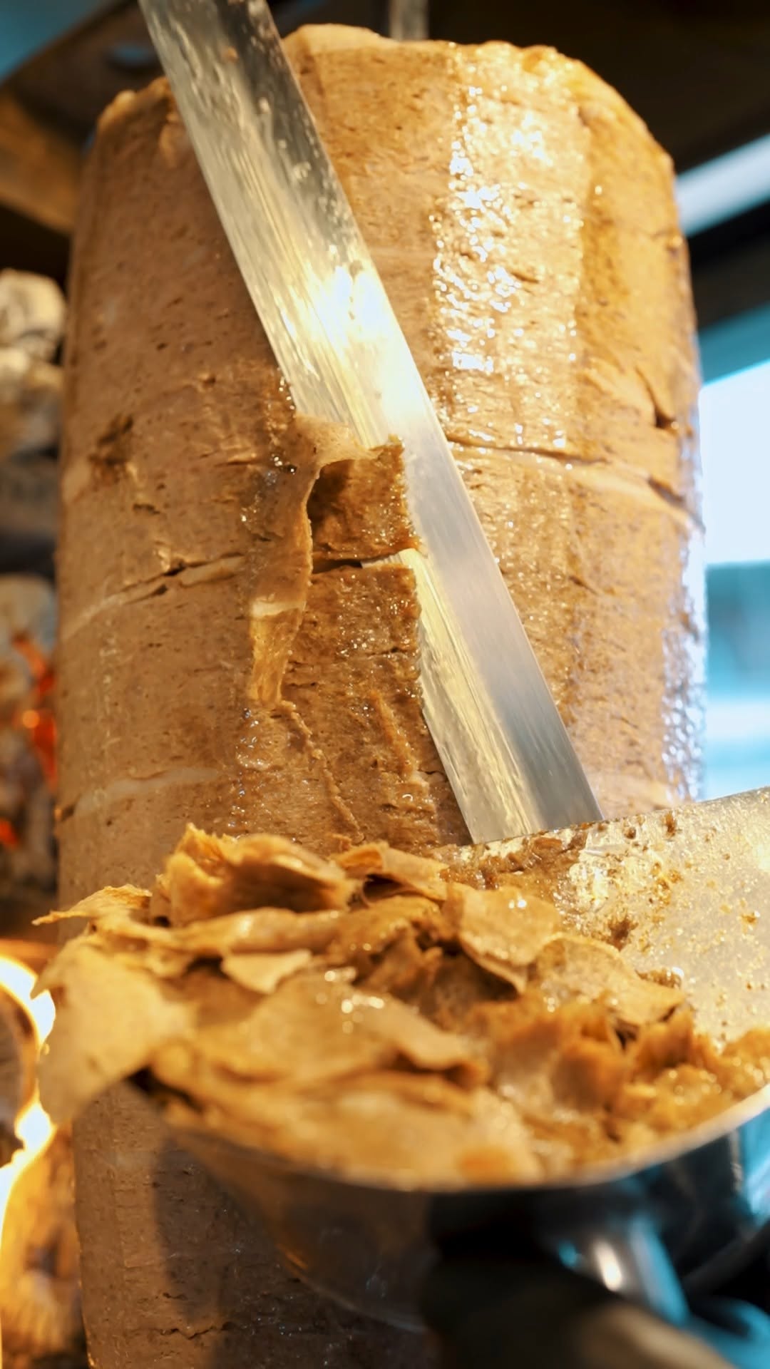 Bursa İskender Kebabı: appetizing close-up of kebab preparation