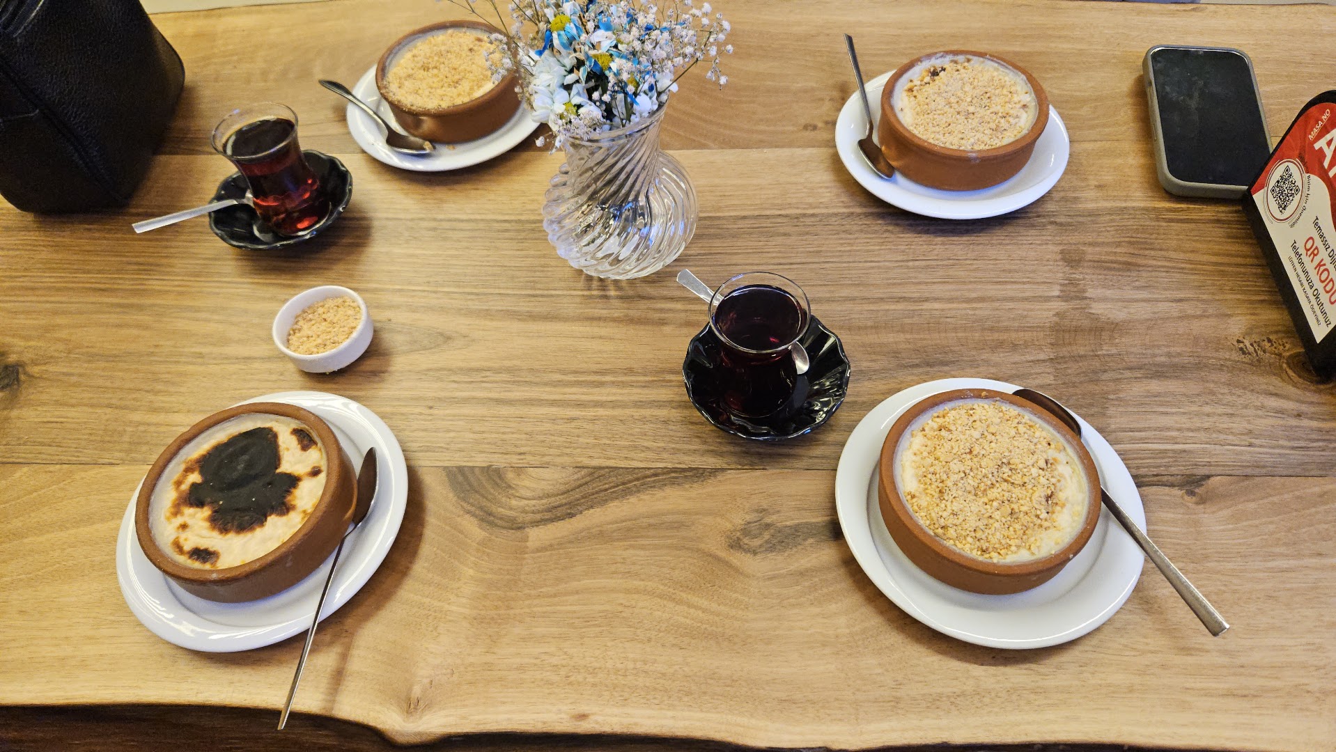 Uğur Usta Hamsiköy Sütlacı: appetizing food presentation on table