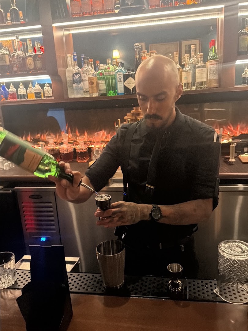 Ashes: professional bartender preparing a drink