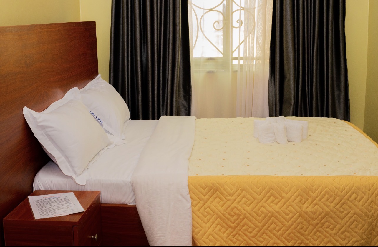 T. Will's Hotel: clear, professional hotel room photo