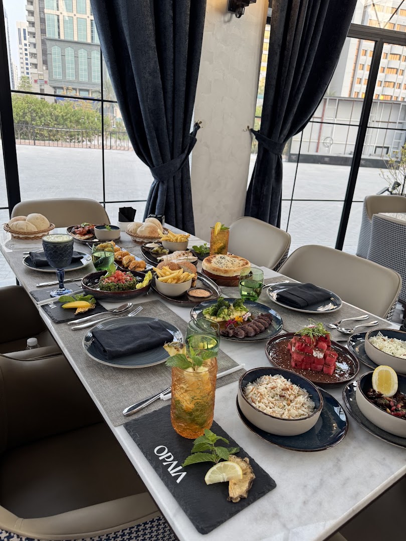 OPAIA Restaurant & Lounge: appetizing food spread and atmosphere