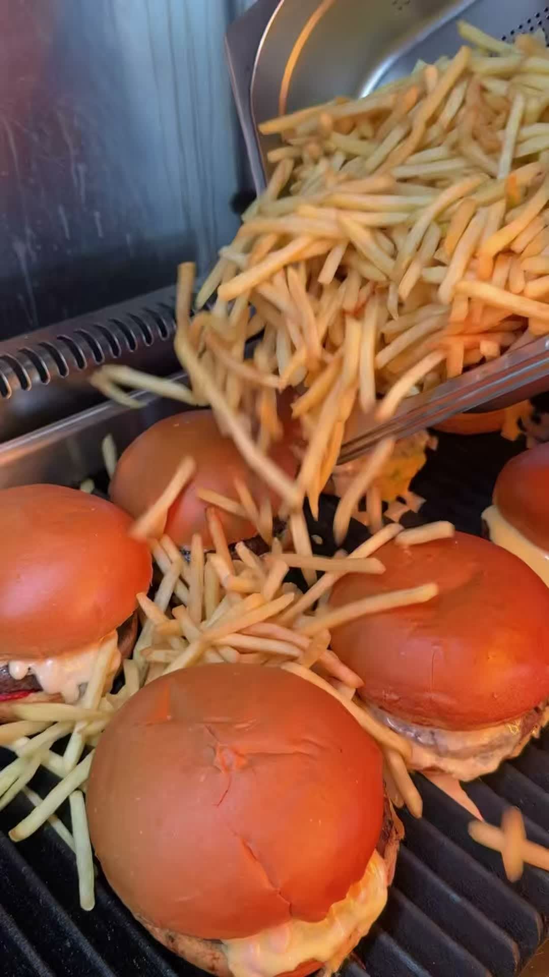 Wahmy Burger: appetizing food preparation action shot
