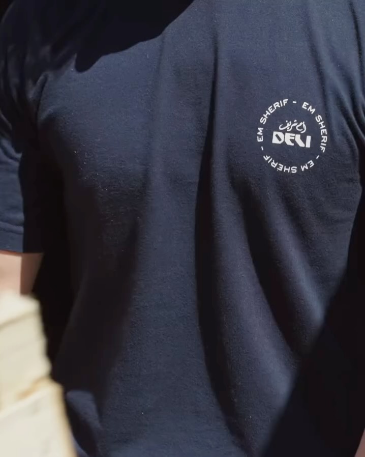 Em Sherif Deli: professional staff uniform branding