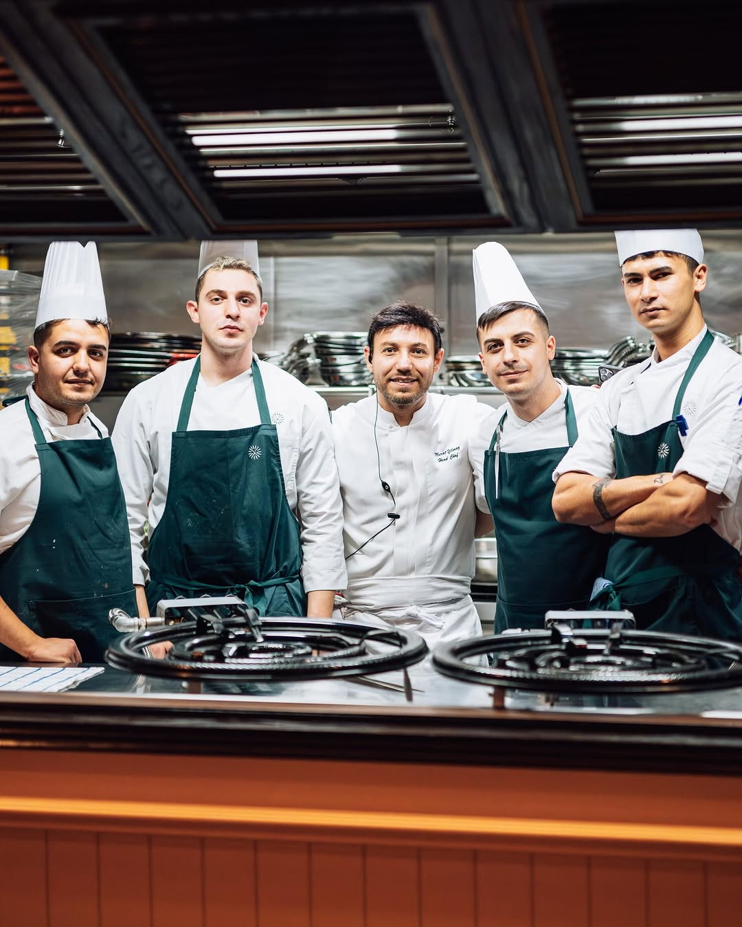 Lion in the Sun: professional team photo in kitchen