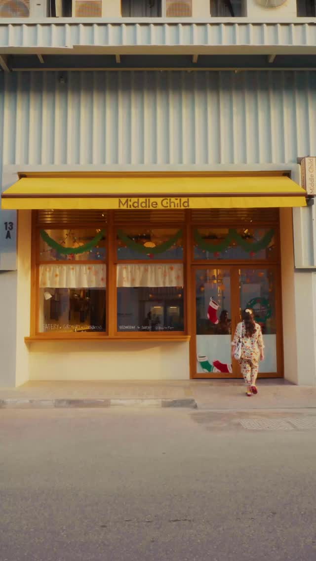 Middle Child: clear, professional storefront photo