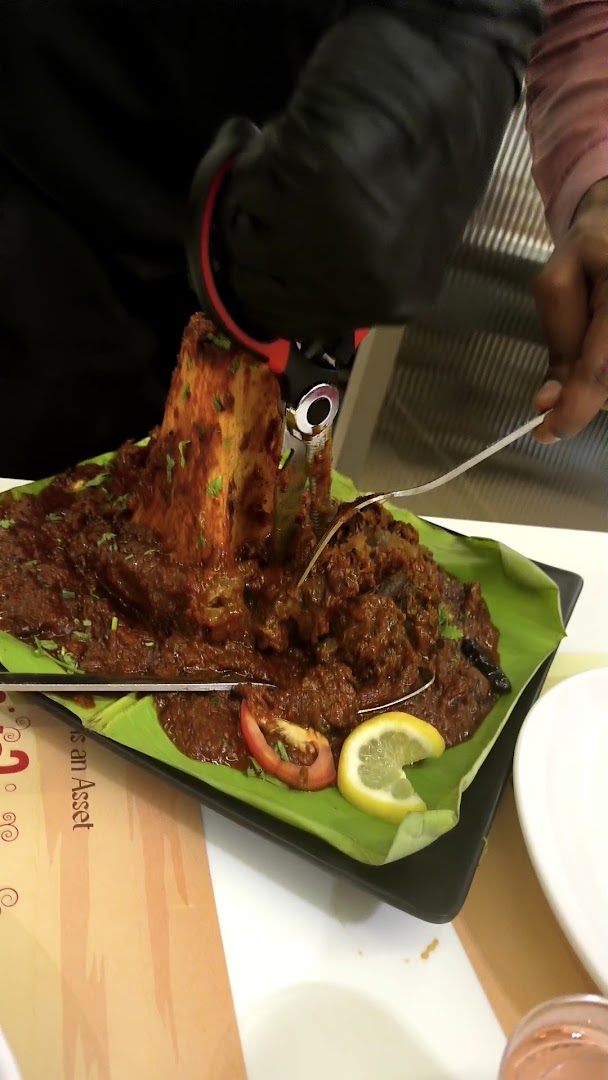 Keerthi Restaurant: appetizing food preparation shot