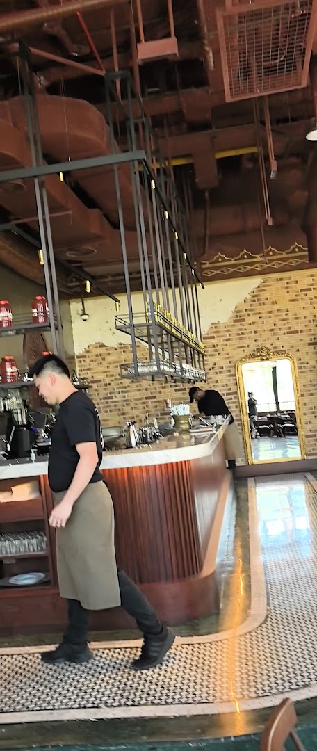 Berenjak Sharjah: restaurant interior and staff
