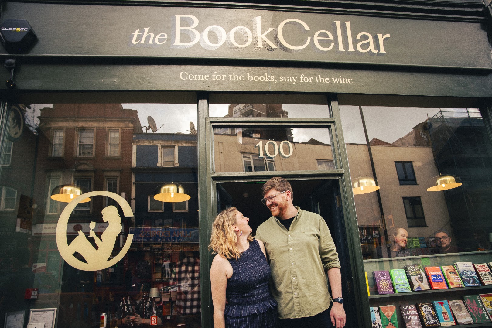 the BookCellar: professional storefront photo with customers