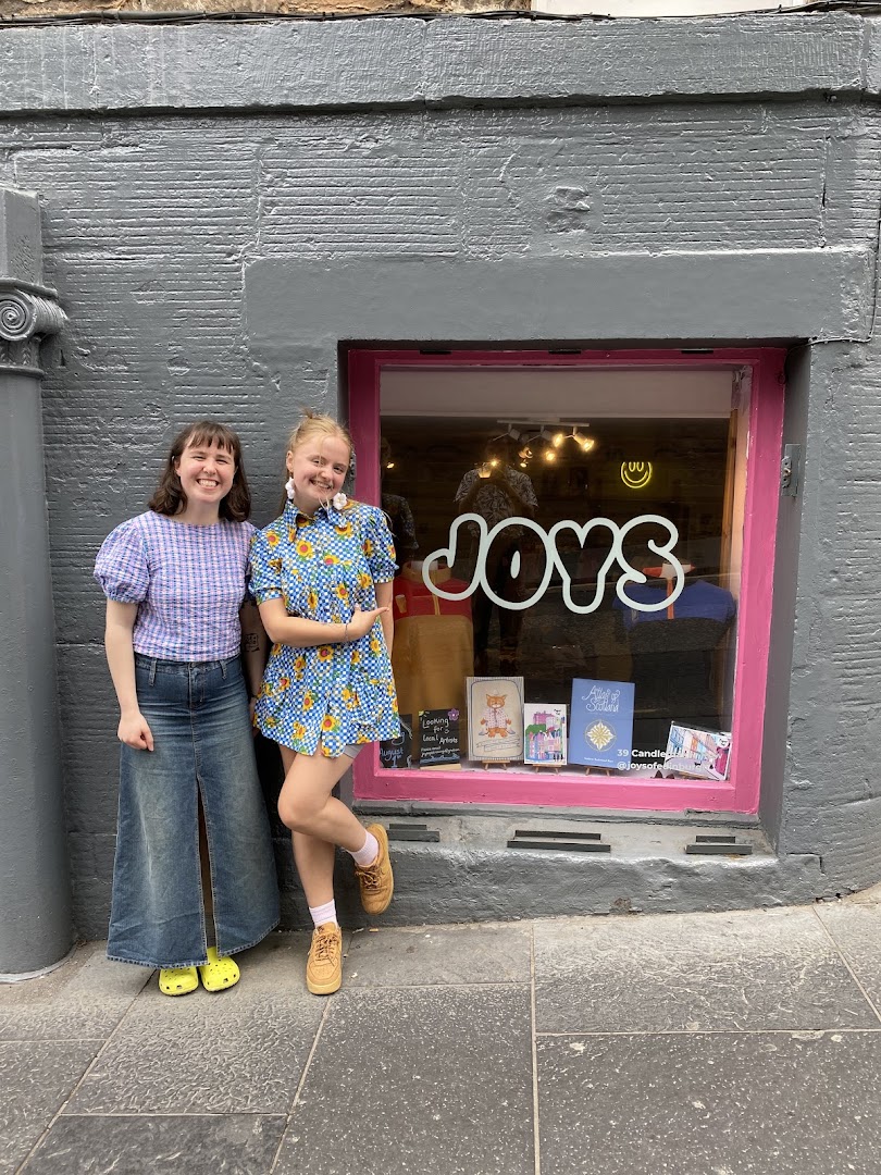 Joys of Edinburgh: clear storefront photo with staff