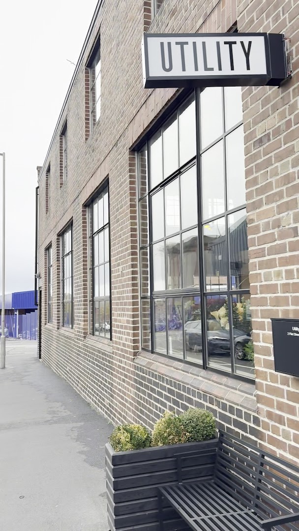 Utility Showroom: clear, professional storefront exterior shot