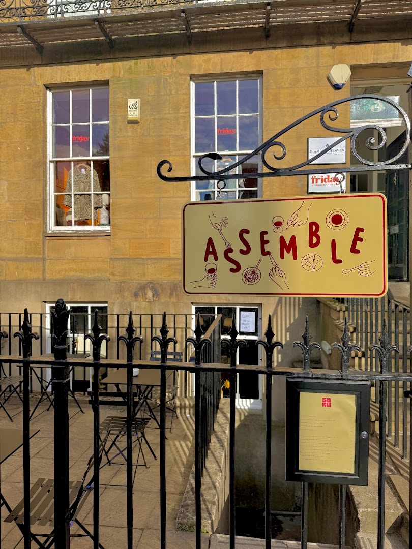Assemble: clear exterior shot showing signage
