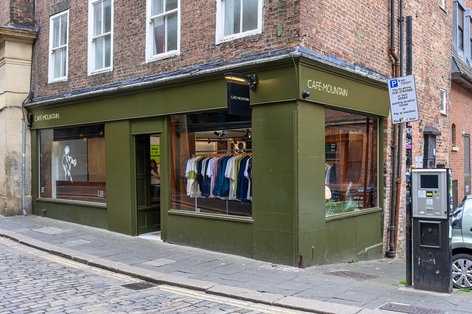 Café Mountain: clear storefront photo of shop