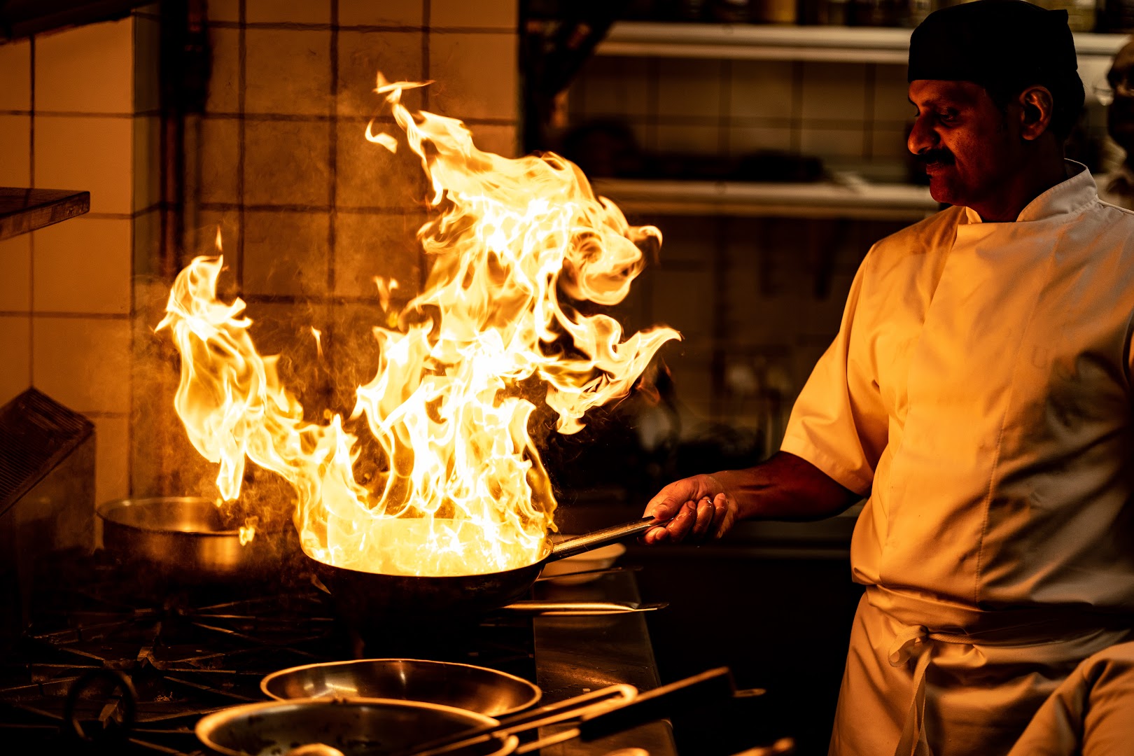 Dinithi: professional action shot of chef