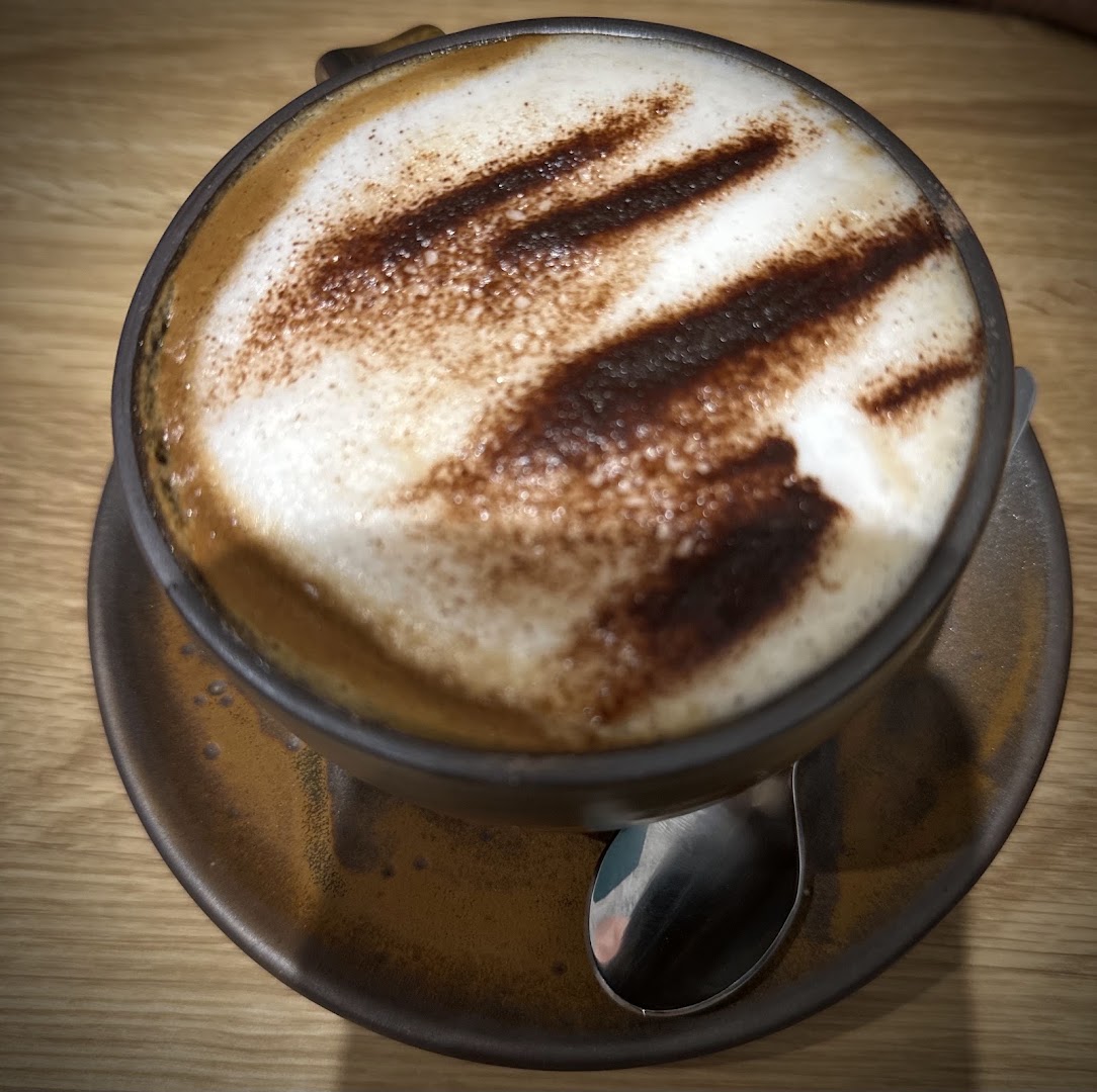 One Up: appetizing photo of coffee drink