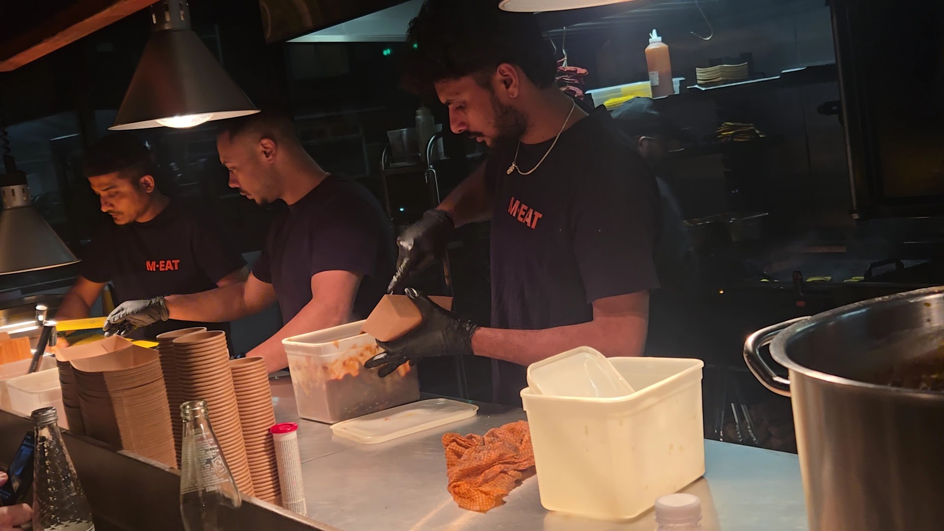 MEAT Smokehouse: professional staff preparing food