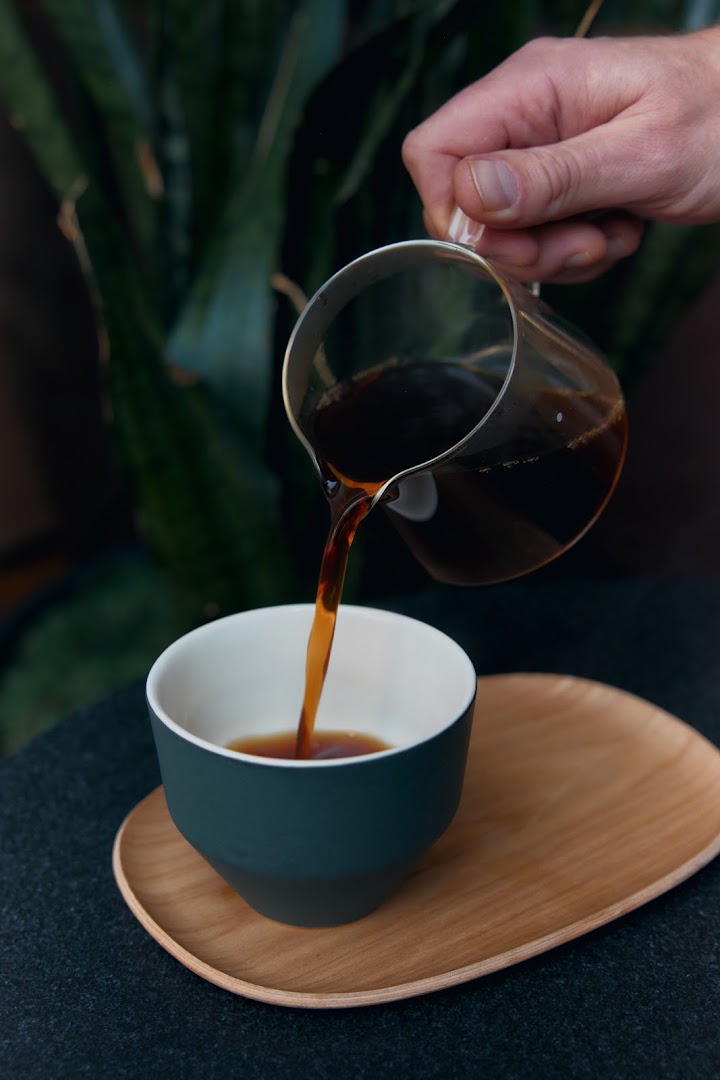 Black Fox Coffee: high quality coffee pouring shot