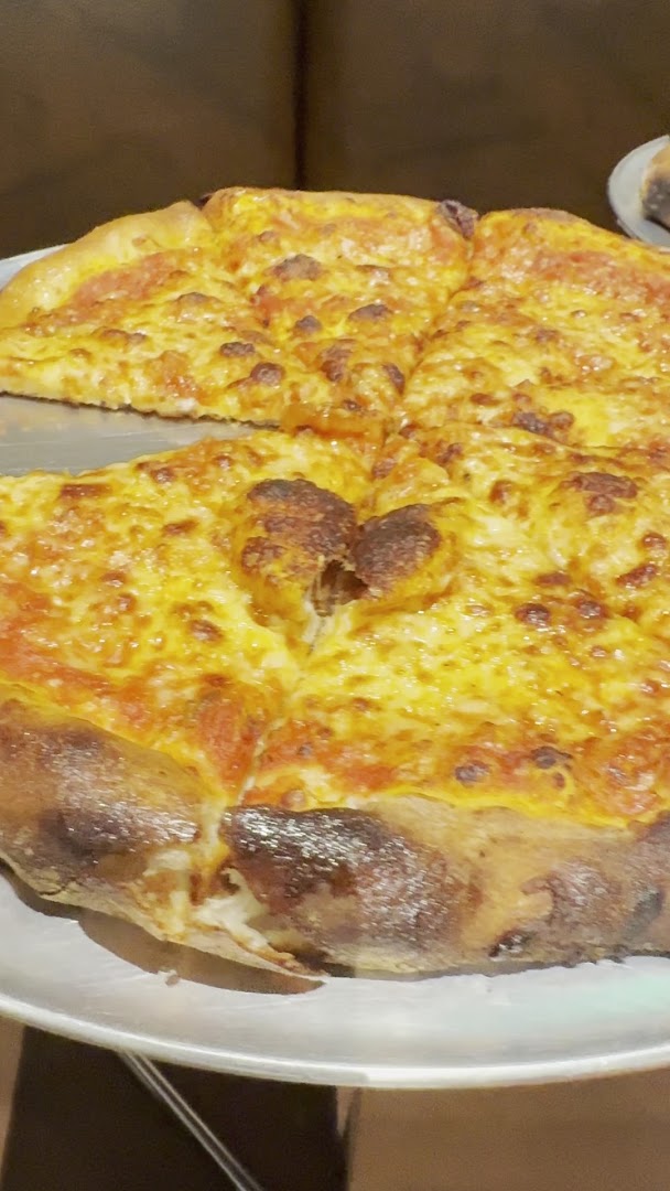 Outlaw Pizza: appetizing photo of restaurant pizza