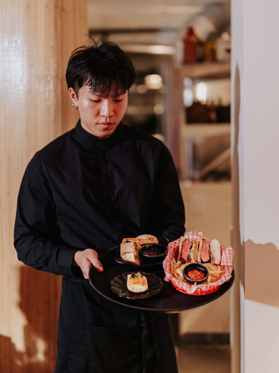 Mai: professional photo of staff serving