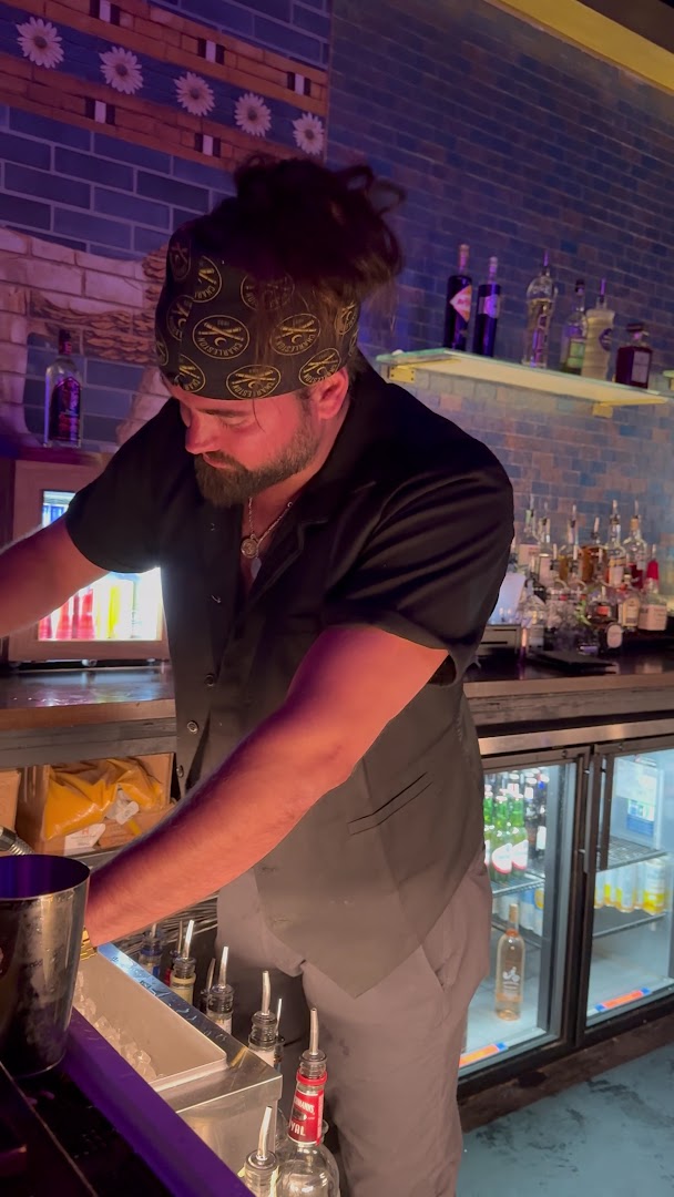 Babylon: professional photo of bartender working bartender