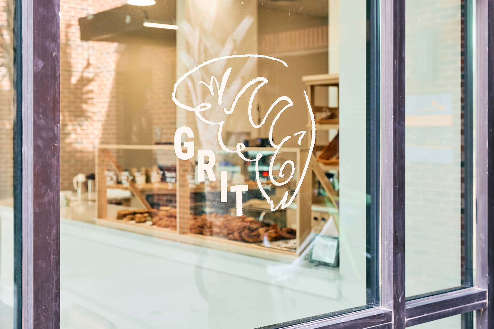 Grit Bakery: clear, professional shot of storefront