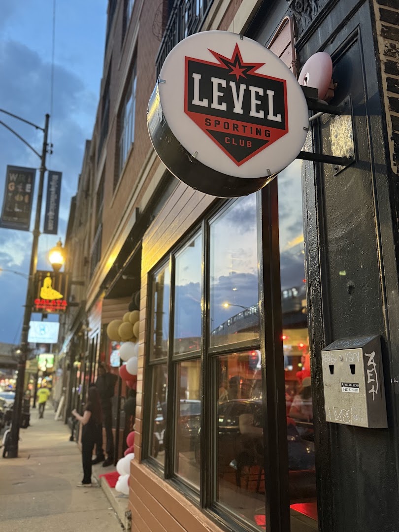 Level Sporting Club: clear exterior shot showing signage