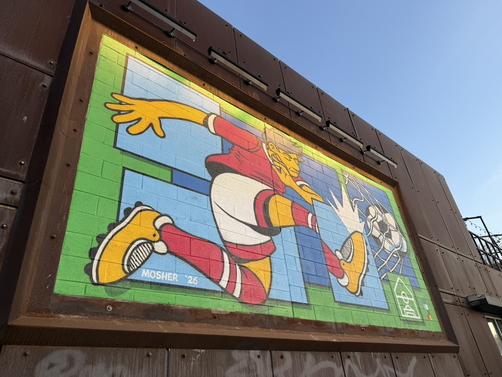 Soccer House: attractive mural representing venue theme