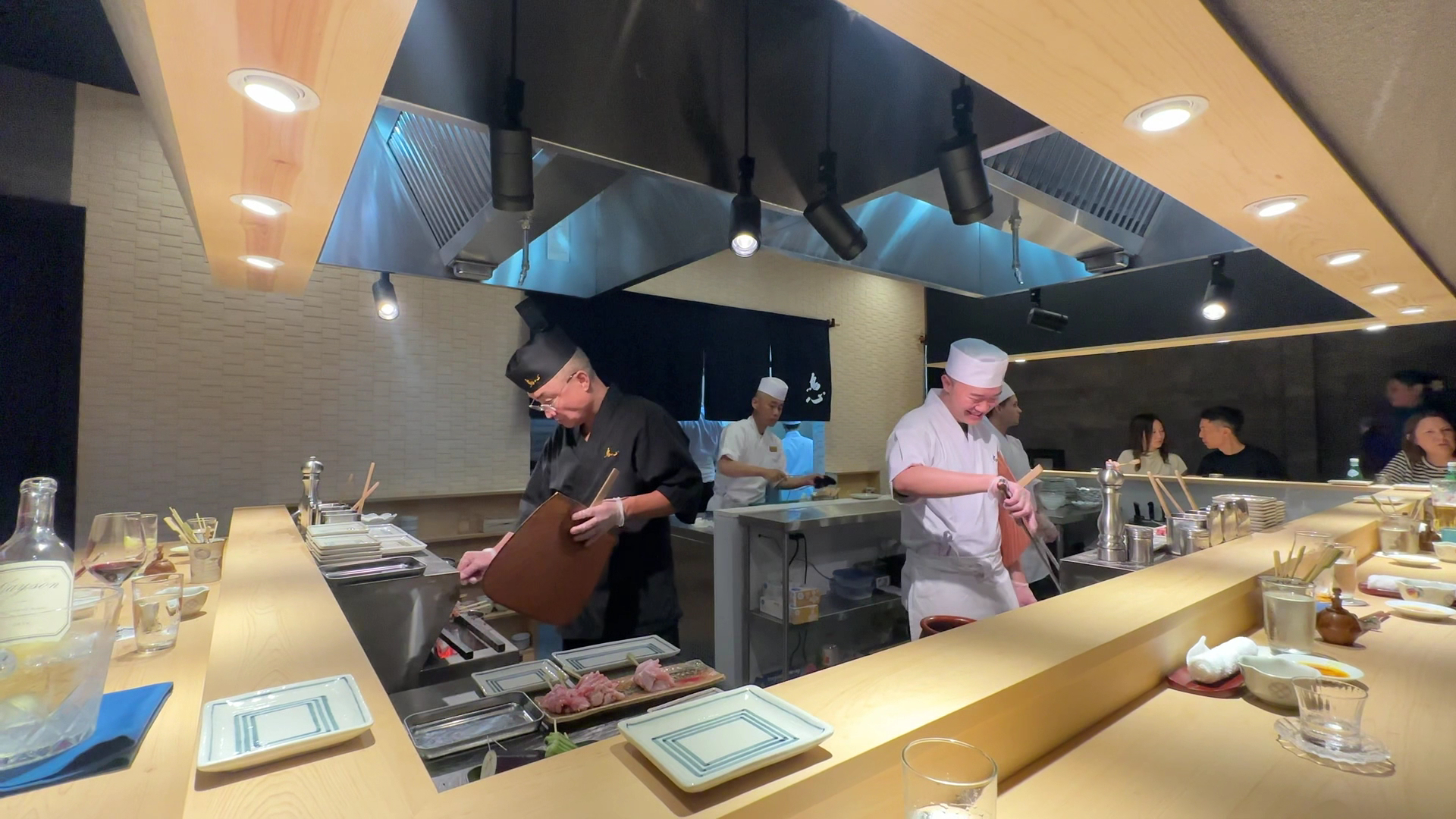 Torishin: professional shot of chefs cooking