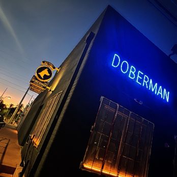 Doberman Drawing Room: attractive exterior shot at night