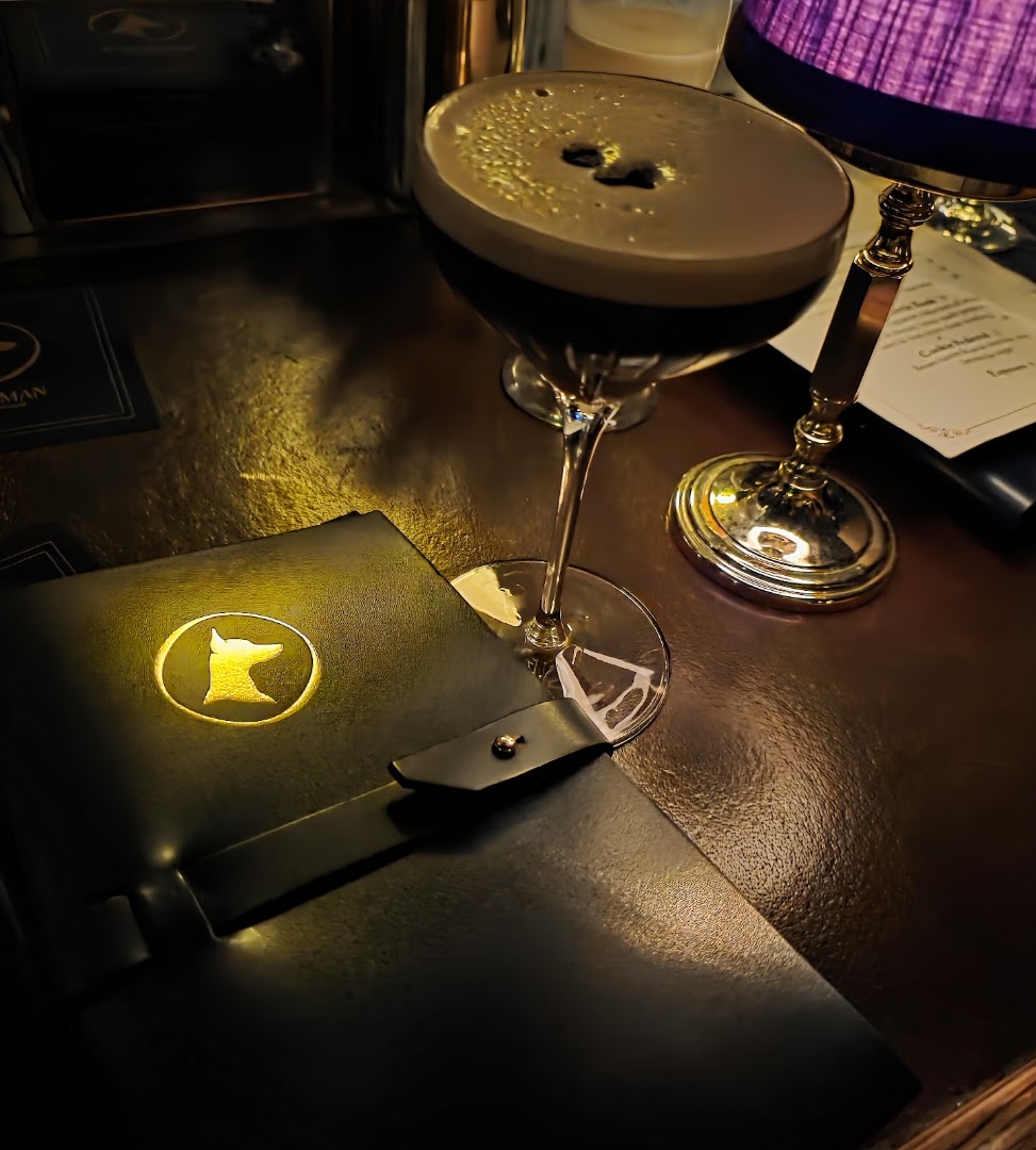 Doberman Drawing Room: atmospheric shot of bar drink
