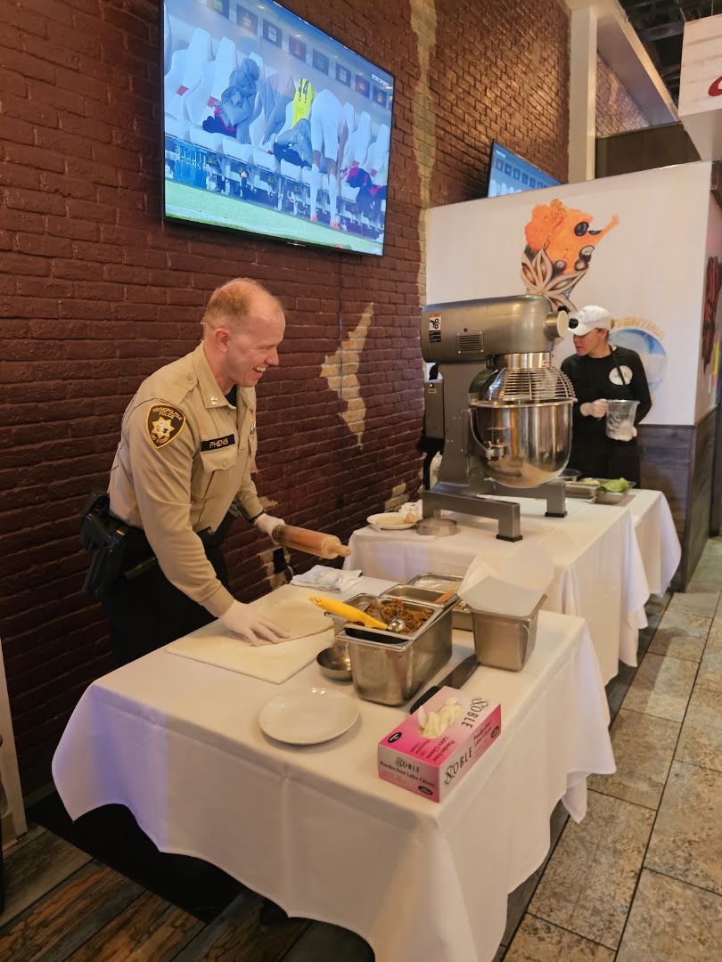 Loaded Empanadas: staff preparing food