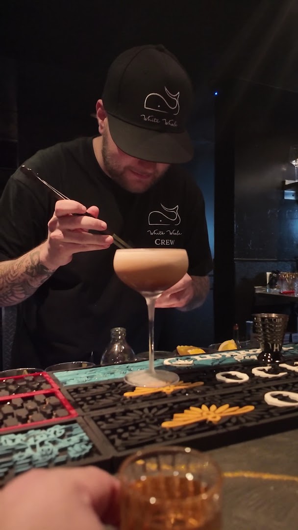 White Whale: professional shot of bartender preparing drink