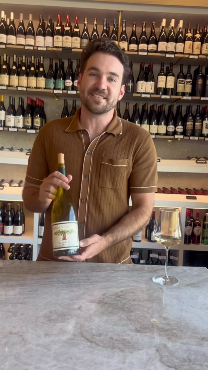 Wineaux: professional staff showcasing wine selection
