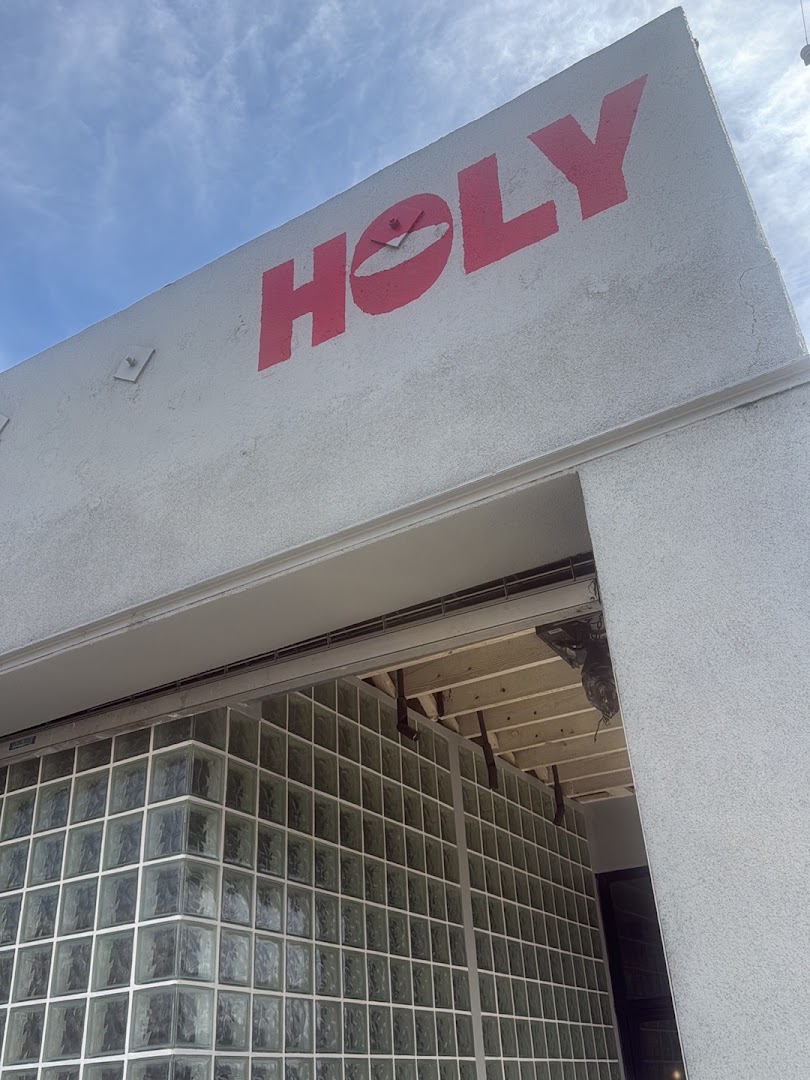 Holy Basil: clear exterior shot of signage