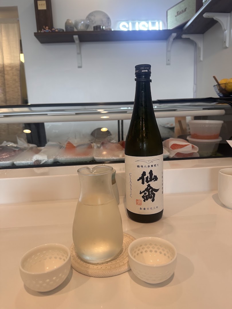 Momo Sake Bar: clear photo of sake service