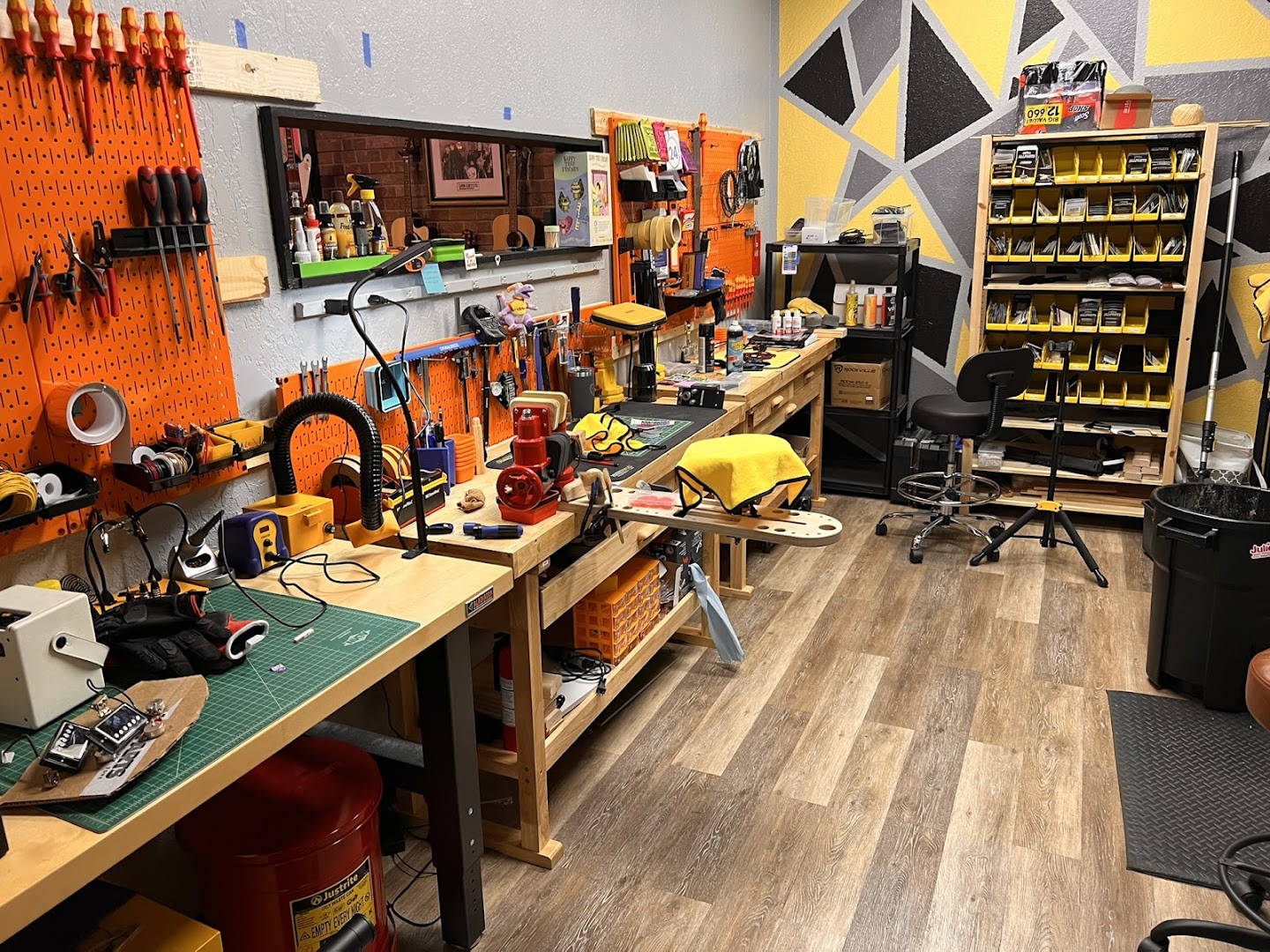 AMP'd Guitar Den: organized, professional workshop space