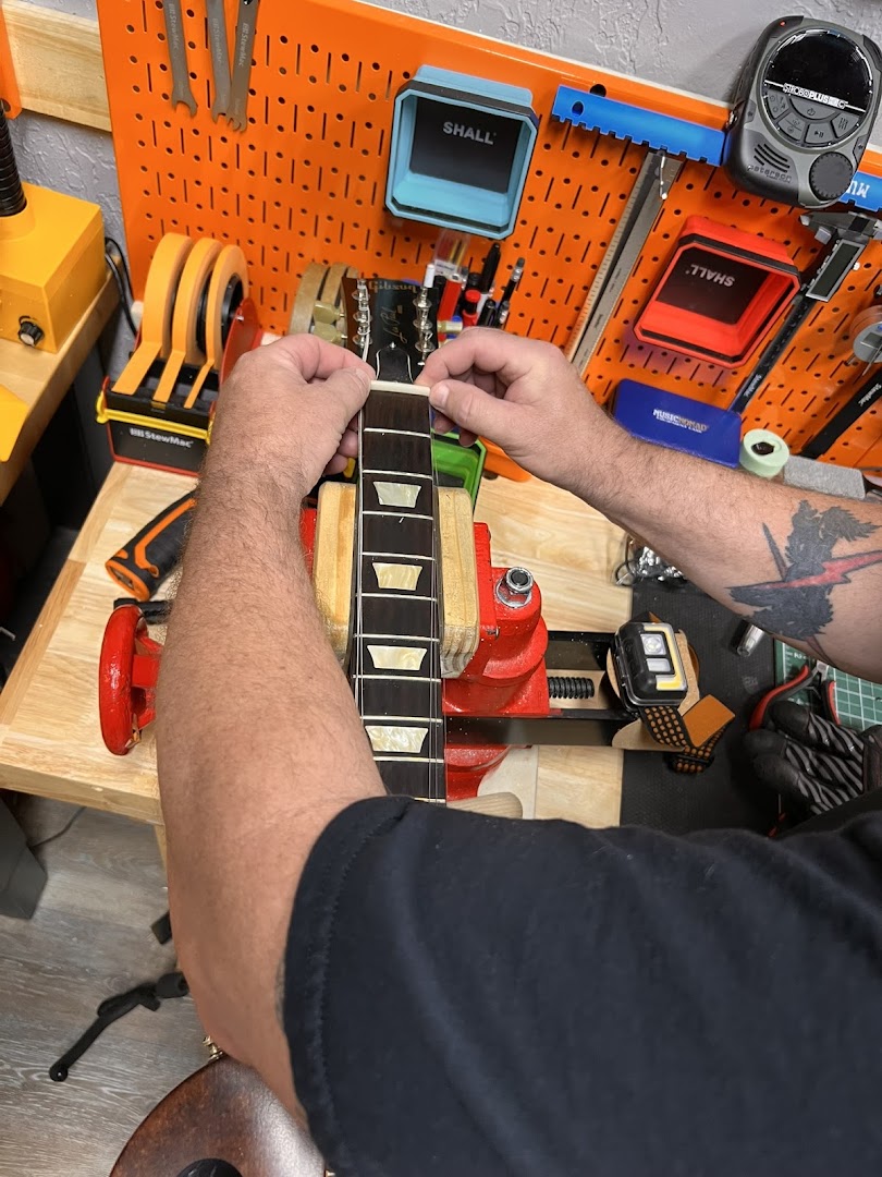 AMP'd Guitar Den: professional guitar repair work